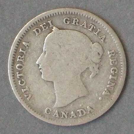 Color photo: Obverse view of 5 cent coin - Canada 1899