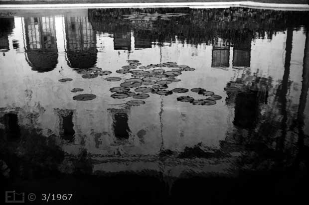 B/W photo: Casa del Prado refleced in water pond - Embedded text: 3/1967