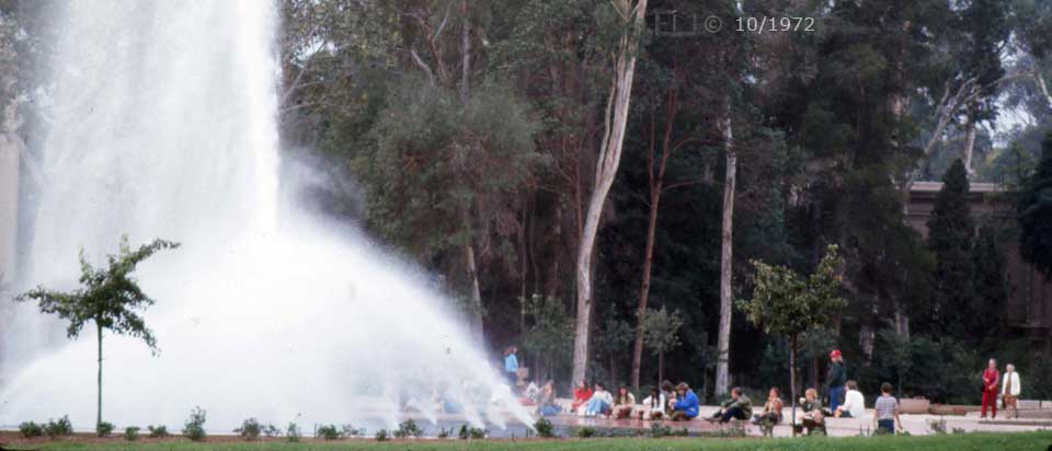 Color photo of large water fountain and surroundings - Embedded text: 10/1972