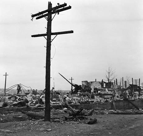 grayscale photograph: ruins of fire