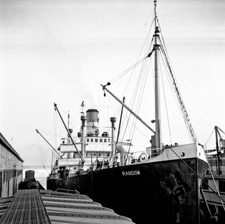 grayscale photograph: 'Random' from atop railway car