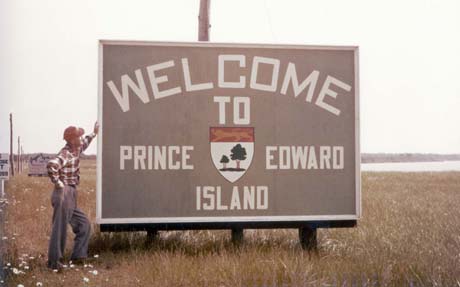 color photograph: Welcome to PEI  billboard