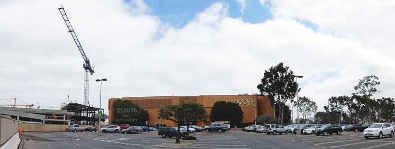 Giant crane to left of Macy's and parking lot