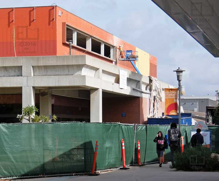 Pedestrian traffic along fence blocking off the "A" building