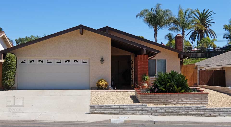 A home with no grass in front yard