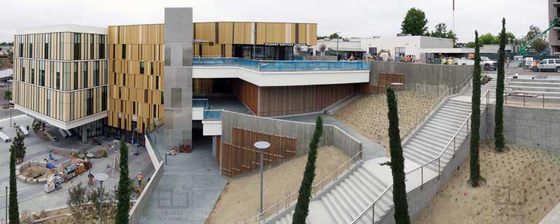 Wide view of Student Services Building, with soon to be Science Building on right.