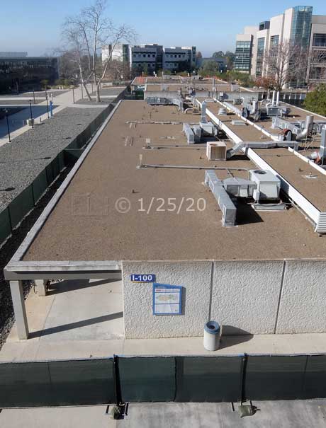 I100 building beyond fence,elevated view