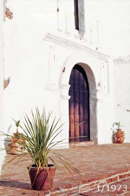 Color photo: Front entrance of mission's church - Embedded text: 1/1973