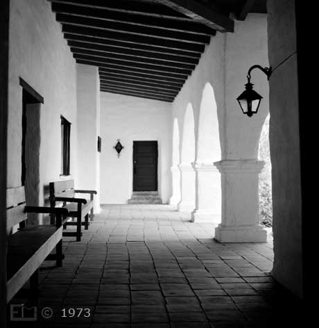 B/W photo: Large wall mounted crucifix - Embedded text: 1972