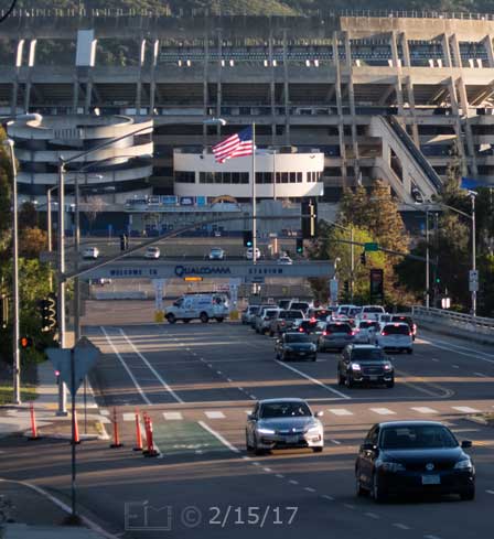 Color photo: View of Qualcomm Stadium from accross Misssion Village Drive / Friars Road intersection - Embedded text: 2/15/17