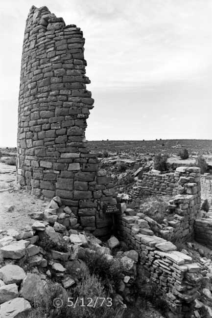 B/W photo: Remaining ruin of cylindrical  pueblo structure - Embedded text: 5/12/73