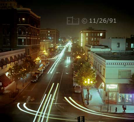 Color photo: Elevated view of F st. and traffic from East side of Horton Plaza - Embedded text: 11/26/91