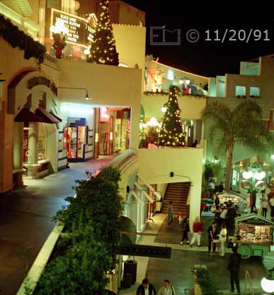 Color photo: Multiple levels of storefronts at Horton Plaza - Embedded text: 11/20/91