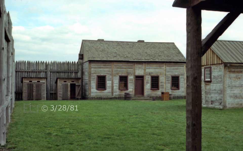 Color photo: Utility buildings within palisades - Embedded text: 3/28/81