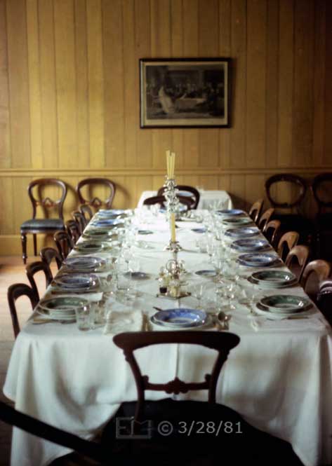 Color photo: A dining table set for 16 - Embedded text: 3/28/81
