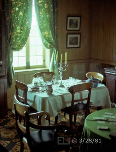 Color photo: Window lit table set for dining by 4 with card table in foreground - Embedded text: 3/28/81