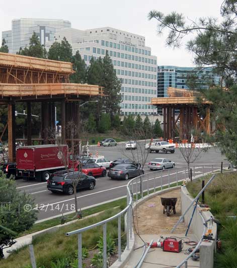 Color photo: Genesee Ave/La Jolla Village Dr intersection with construction of UTC walkway in foreground - Embedded text: 12/14/18