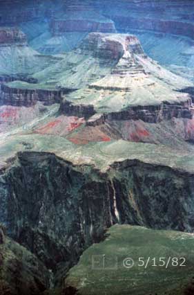 Color photo: Portrait view of Cheops Pyramid with plateau and Canyon wall in foreground - Embedded text: 5/15/82