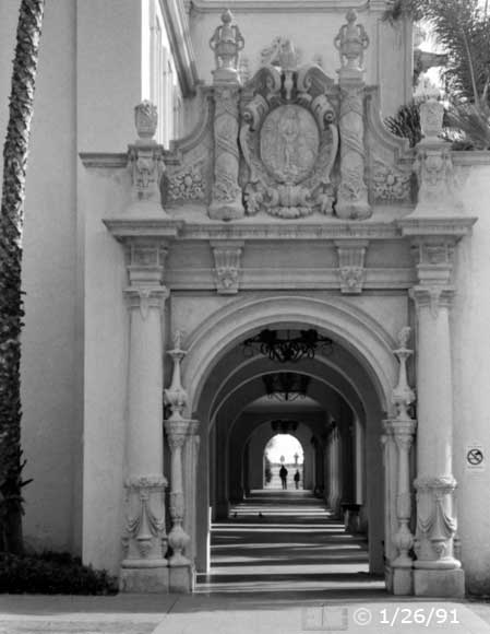 B/W photo: Portrait view of entrance to arched walkway - Embedded text: 1/26/91