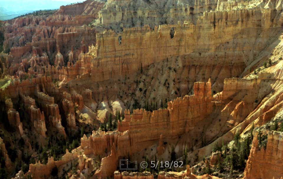 Color photo: Landscape view from rim of multitudes of pillars, pinnacles and spires - Embedded text: 5/118/82