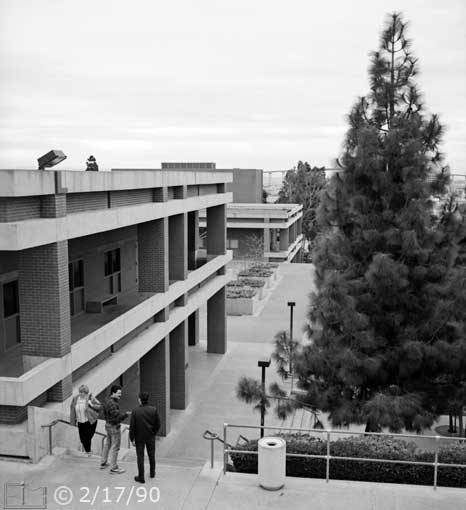B/W photo: Elevated view of stair-way on the West side of 'L' building - Embedded text: 2/17/90
