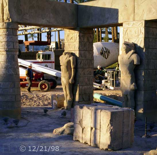 Color photo: Demolition and construction in front of 'Luxor' pyramid  - Embedded text: 12/21/98