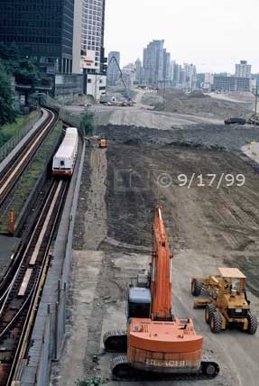Color photo: A construction zone alogn side tramway tracks - Embedded text: 9/17/99