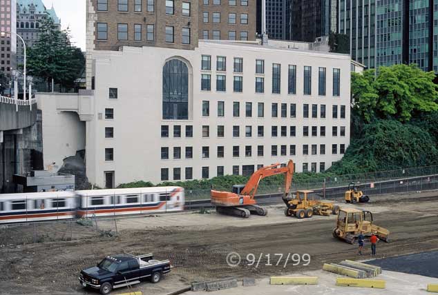 Color photo: A construction zone alogn side tramway tracks - Embedded text: 9/17/99