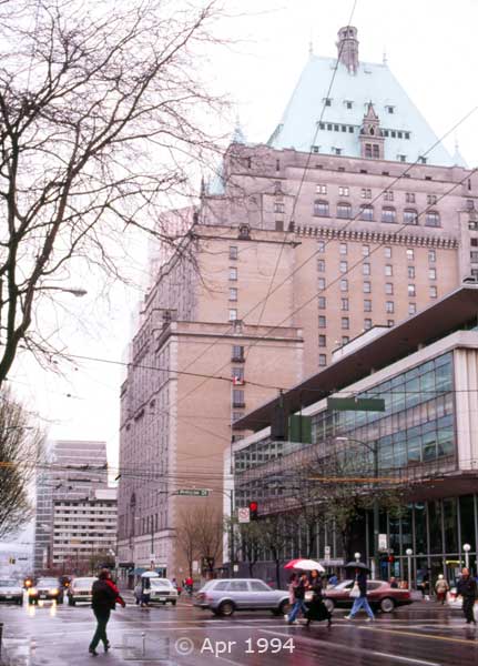 Color photo: Street traffic and buildings of downtown Vancouver - Image taken: 4/7~12/1994