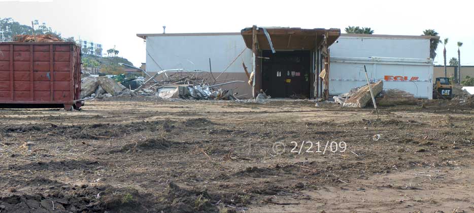 Color photo: Frontal view of south end entrance of old building - Embedded text: 2/21/09