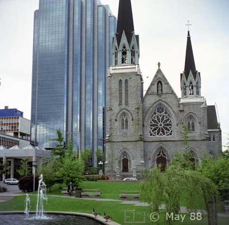 Color photo: Holy Rosary Cathedral viewed from Cathedral Park - Embedded text: May 1988