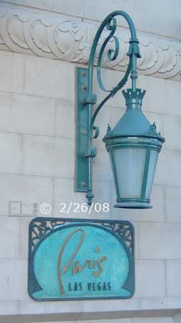 DSC color photo: Lamp/Signage at entrance of Paris Casino/Hotel - Embedded text: 2/26/08