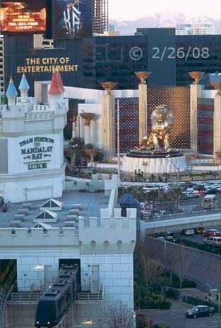 Film color photo: View from Excalibur room #712 of MGM Grand and pedestrian tram station - Embedded text: 2/26/08