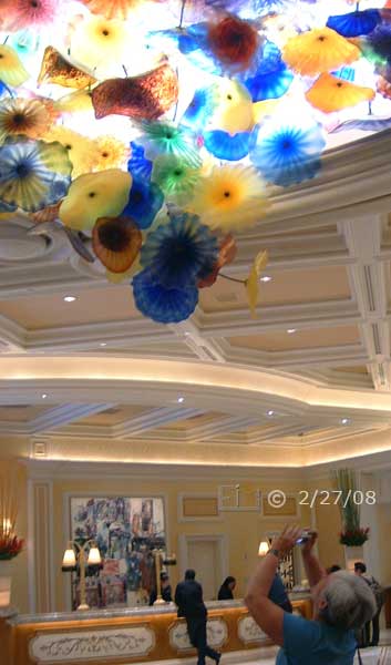 Dsc color photo: Bellagio's stained glass display being photographed- Embedded text: 2/27/08
