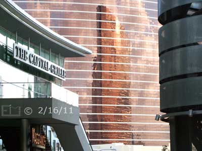 DSC color photo: Reflection of one casino/hotel on another; Fashion Show Mall in foreground - Embedded text: 2/16/11
