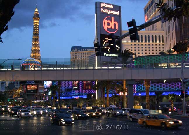 DSC color photo: Las Vegas Blvd traffic during twilight (Harmon Ave) - Embedded text: 2/16/11