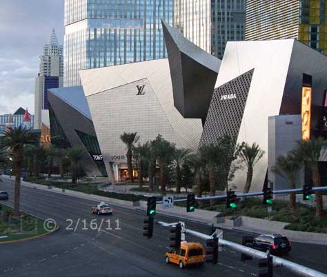 DSC color photo: Pedestrian overpass level view, looking south, of Las Vegas Blvd, from Harmon Ave - Embedded text: 2/16/11