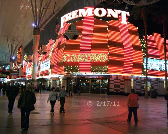 DSC color photo: Nighttime, street view of Fremont Casino - Embedded text: 2/17/11