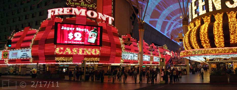 DSC color photo: Wide, nighttime view of 'Fremont Street Experience' casinos (AKA: Downtown) - Embedded text: 2/17/11