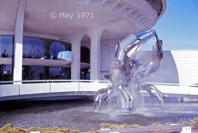 Color photo: Landscape view of Crab Sculpture/Fountain and Vancouver Planetarium - Embedded text: May 1971