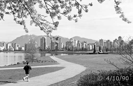 B/W photo: A construction zone alogn side tramway tracks - Embedded text: 4/10/90