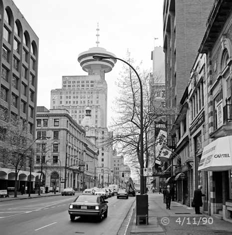 B/W photo: A Vancouver/West Hastings St. street scene - Embedded text: 4/11/90
