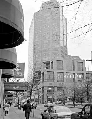 B/W photo: Street scene in front of a Hotel Vancouver entrance - Embedded text: 4/11/90