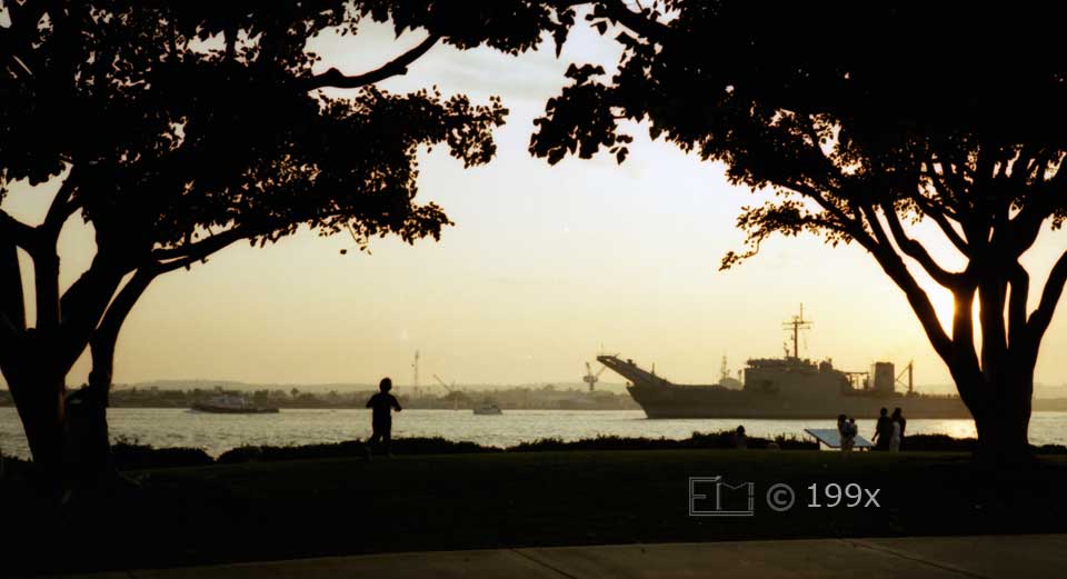 Color photo: Late in day view of San Diego Bay from Embarcadero Marina Park - Embedded text: 199x